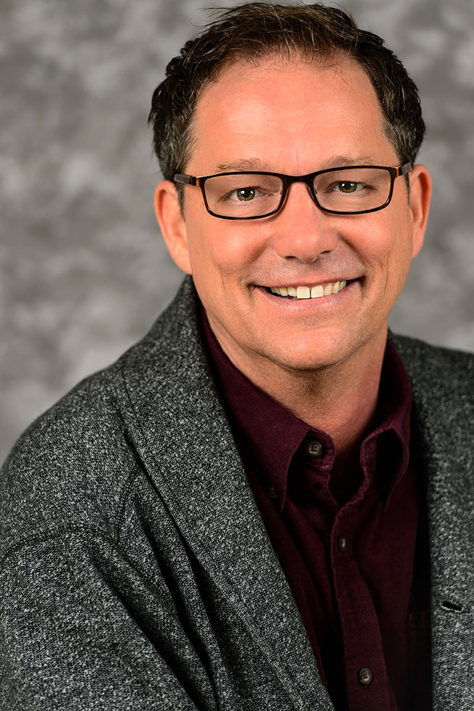 Portrait of Jim Brillon smiling